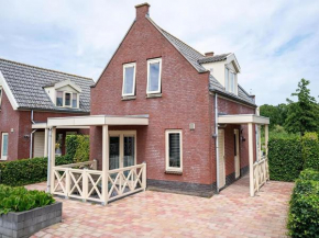 Lovely holiday home on water with garden